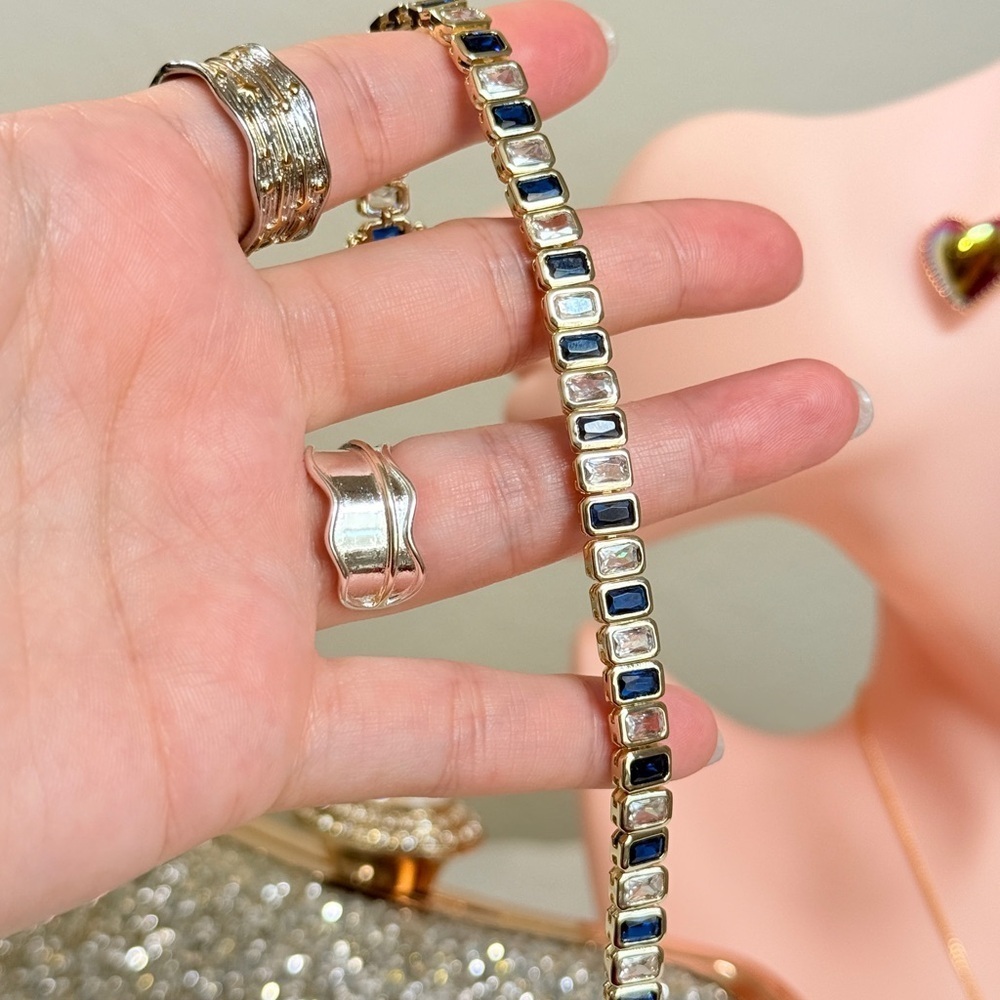 Classic 18Kt Gold Plated Bracelet With Blue and Clear Cubic Zirconia - Picture 8 of 12